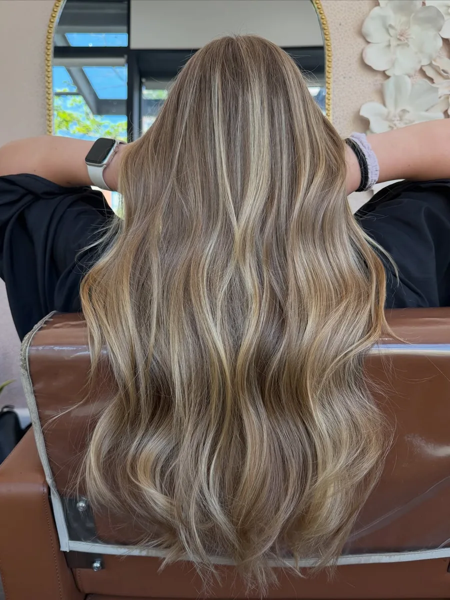 Dimensional blonde colour with cool ribbons and natural depth